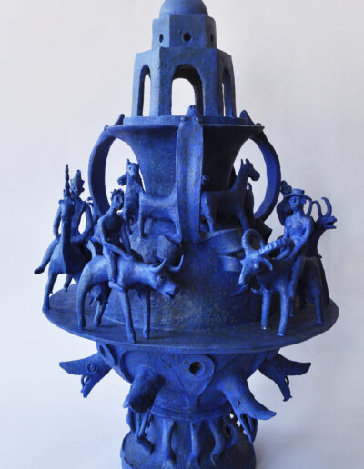 James Mortimer Sculpture Ceramic Blue architectural vase with figures riding animals